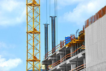 Crane and highrise construction site