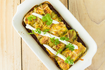 Homemade cabbage leaf chicken enchiladas.