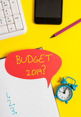 Text sign showing Budget 2019 Question. Business photo showcasing estimate of income and expenditure for next year Empty red bubble paper on the table with pc keyboard
