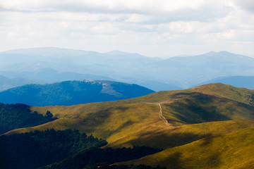 Naklejka na ściany i meble Landscape of Borzhava ridge of the Ukrainian Carpathian Mountains. Clouds above Carpathians.