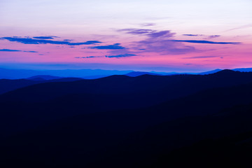 Purple sunset landscape in the mountains. Location place Ukraine, Borzhava ridge.