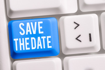 Text sign showing Save The Date question. Business photo showcasing asking someone to remember specific day or time White pc keyboard with empty note paper above white background key copy space