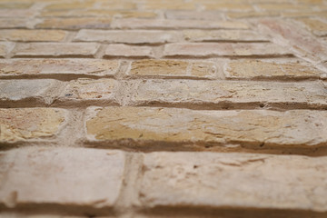 Interesting texture of parallel elements. The wall is enclosed from facing bricks.