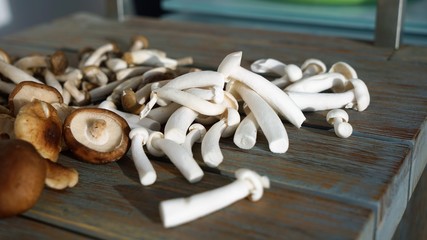fresh mushrooms on a wooden surface
