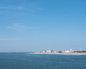 town and beach of german island norderney seen from ferry to mainland