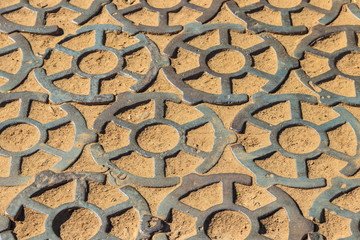 Cast-iron pavement in Kronstadt, Russia. Background, texture