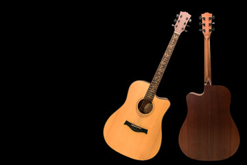 Naklejka premium Front and back acoustic guitar on a black background