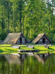 ancient fishing village by the lake with boats