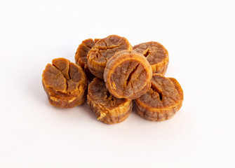 a group of dried scallops on white background