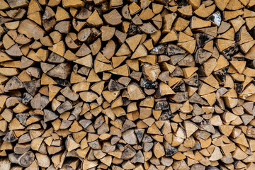Wooden logs stocked under the roof texture