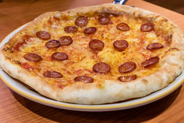 Chorizo sausage pizza with cheese