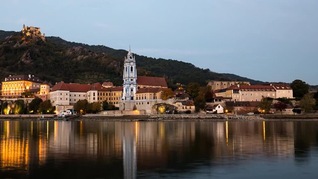Day to night hyperlapse panorama of Durnstein town, Wachau valley, Austria.