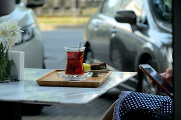 Turkish tea on a table in an outdoor cafe,