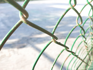 Mesh chain-link fence close up macro shot