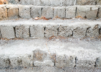 Limestone steps in front of an abandoned house