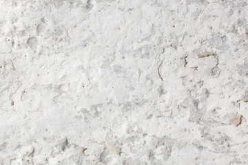 Stone wall with clay and whitewashed background texture