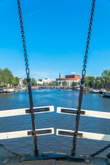 Amsterdam, North Holland / Netherlands - June 22nd, 2019: The river Amstel seen from the Magere...