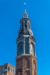Amsterdam, North Holland / Netherlands - June 22nd, 2019: The Munttoren bell tower / Close-up