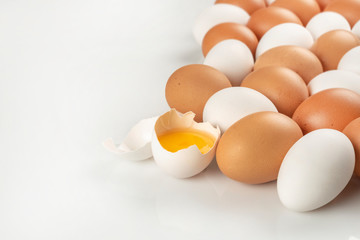 Fresh farm eggs. Brown and white colored fresh eggs