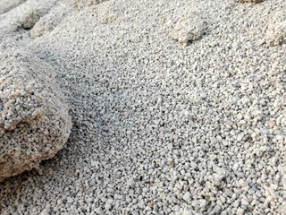 Mineral fertilizer of cereal in the agricultural industry. Nitrogen, phosphorus and potassium to strengthen the grain. Manure balls. Industrial quantity of nutrient for agriculture.