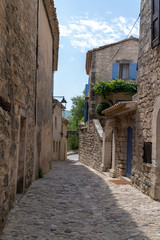 Lacoste village in Vaucluse Provence France ancient stone alley in the old town