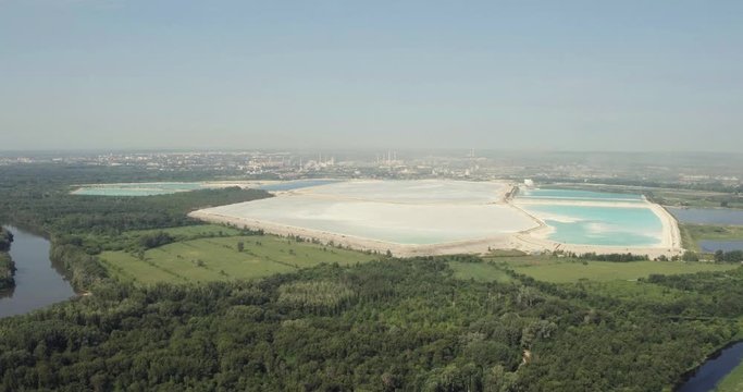 The largest factory in the world of baking soda (bicarbonate) / big blue reservoir - Aerial drone view
