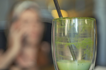 an empty cup of soft drink is matcha