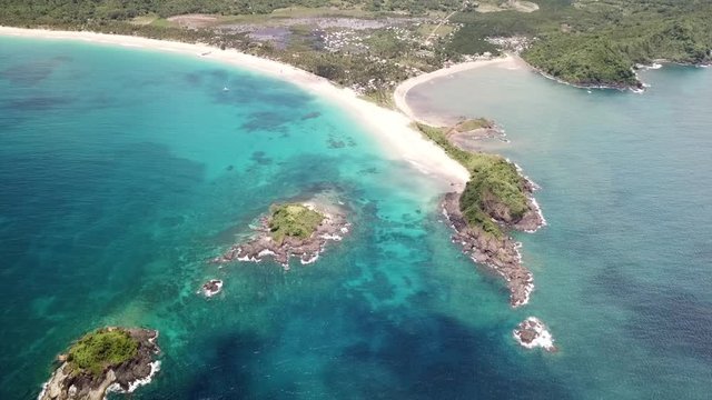 Stunning Aerial View Of The Nacpan Beach on a sunny day In El Nido Palawan, Philippines. 4K Drone Shot.