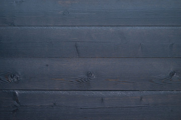 Black wooden planks background.