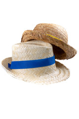straw hat with blue yellow ribbon isolated on a white background