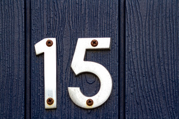 House number 15 in elegant silver digits