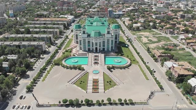 Astrakhan State Opera and Ballet Theater. Located in the center of Astrakhan. Built not long ago. A place to relax and watch the theater and performances. View from above. Russia.