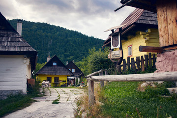 Photograph of the streets of Vlkolinec, the typical houses of the city and their daily life....