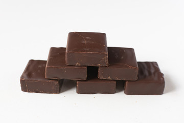 Chocolate candies on a white background.