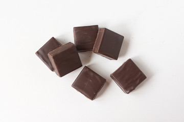 Chocolate candies on a white background.