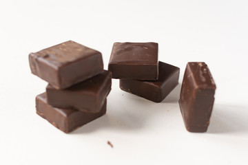 Chocolate candies on a white background.