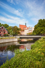 Fototapeta na wymiar Brda river canal at Mlynska Island (Mill Island) in Bydgoszcz, Poland.