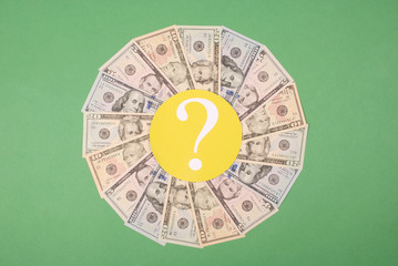 Question mark on mandala kaleidoscope from money.