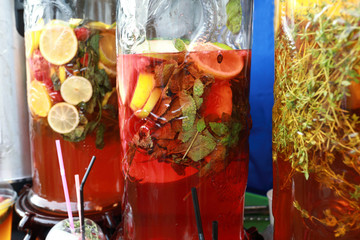 Fototapeta na wymiar Glass containers with fruit juice