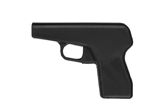 Black rubber dummy gun isolate on a white background. Dummy weapons for training in self-defense. Fake guns made from rubber For the training of police, soldiers and security personnel