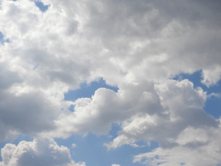 Fluffy clouds zoom shot, day time