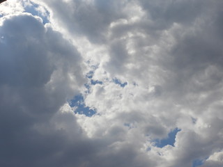 Fluffy clouds zoom shot, day time