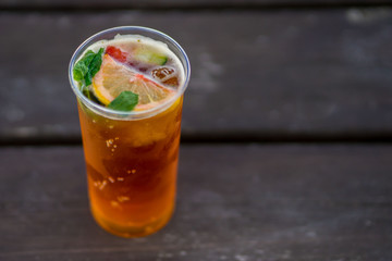 Pimm cocktail on wooden table