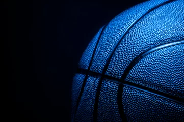Gordijnen Closeup detail of blue basketball ball texture background © Augustas Cetkauskas