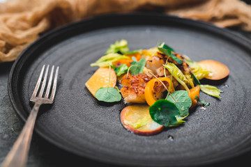 Grilled scallops, ripe and unripe peach, nasturtium leaves, celery