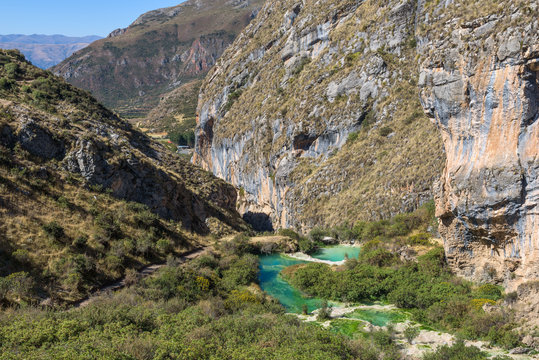 The bright blue colored natural pools of the Millpu Blue Lagoons, Ayacucho, Peru