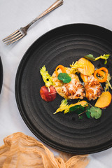 Grilled scallops, ripe and unripe peach, nasturtium leaves, celery
