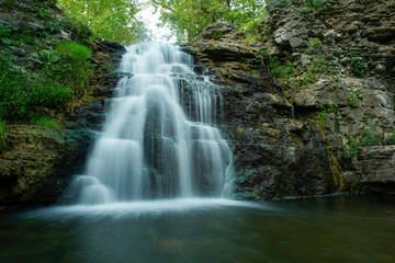 Fototapeta na wymiar Waterfall located at Frace Park Indiana in cass county