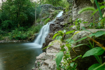 Fototapeta na wymiar Waterfall located at Frace Park Indiana in cass county