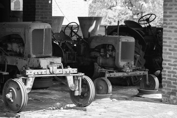 tractor that was forgotten in time, and being corroded by rust, machines that were once used a lot, today are for nothing